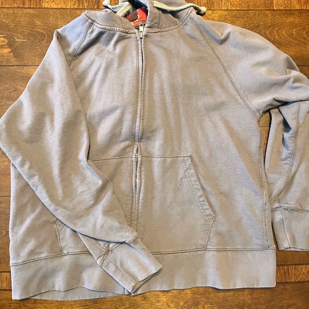 Zip up woman’s coat!